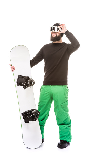 Joven con snowboard
 - Foto, imagen