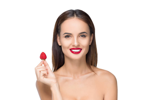 young woman with strawberry - Фото, изображение