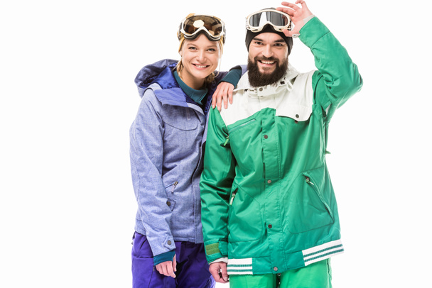 gelukkige paar in Snowboarden kostuums - Foto, afbeelding