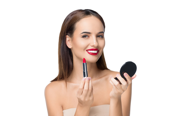 young woman applying makeup - Foto, Imagem