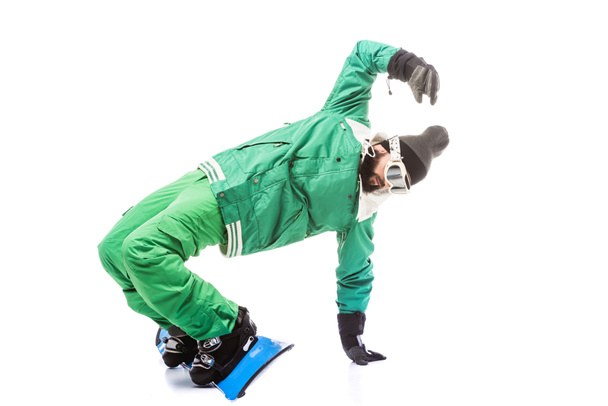 man sliding on snowboard - Foto, imagen