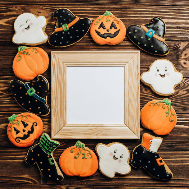 Funny delicious ginger biscuits for Halloween on the table. horizontal view from above - Fotoğraf, Görsel