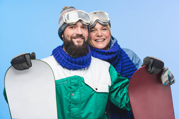 feliz pareja ingenio snowboards
 - Foto, Imagen