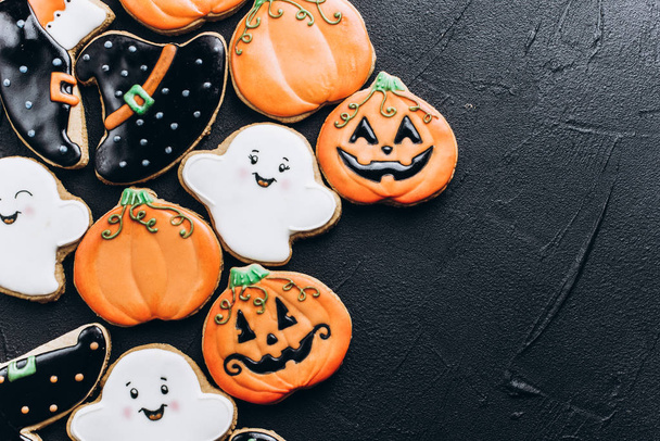 Funny delicious ginger biscuits for Halloween on the table. horizontal view from above - Fotoğraf, Görsel