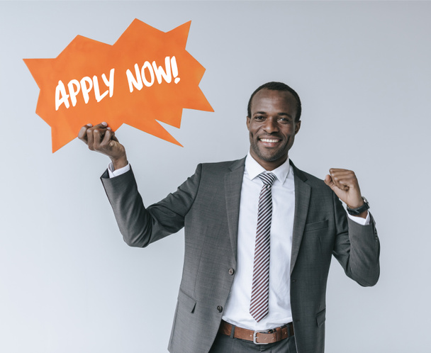 african american businessman with with apply now card - Photo, Image