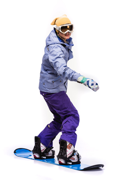 mujer de pie sobre snowboard
 - Foto, imagen
