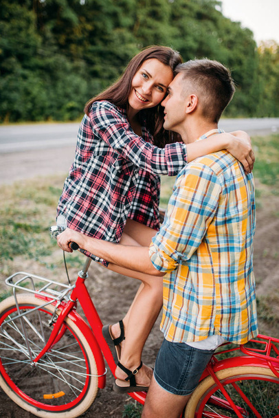 happy love couple on vintage bicycle - Photo, Image
