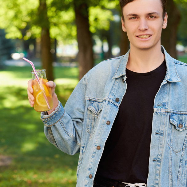 Healthy youth lifestyle. Happy guy with detox - Fotografie, Obrázek
