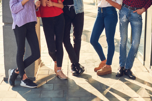 Legs of group of casual young people - Foto, imagen