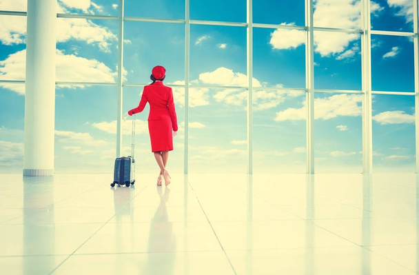 Stewardess in airport - Foto, Imagen