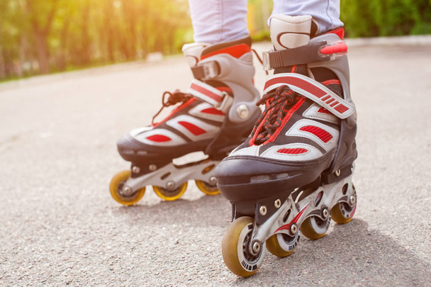 irl teenager rollerblading on the asphalt - Foto, Imagen