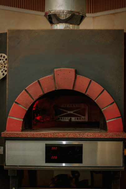 Traditional pizza oven in a italian restaurant. - Fotografie, Obrázek