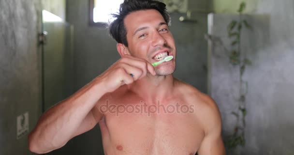 Man Brushing Teeth In Bathroom, Young Guy Happy Smiling Doing Morning Hygiene - Video, Çekim