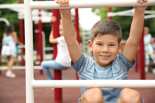 Cute little boy on playground - Zdjęcie, obraz