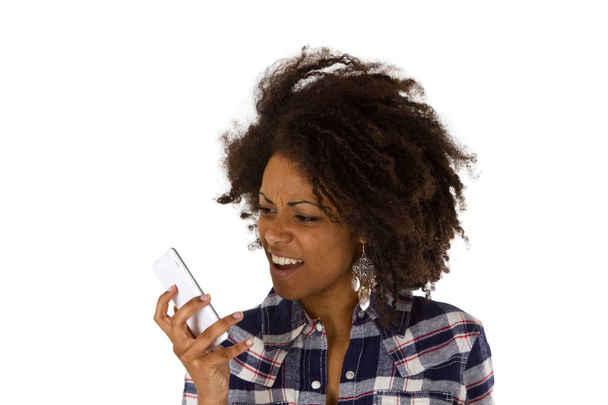 Mujer afroamericana enojada con auricular
 - Foto, imagen