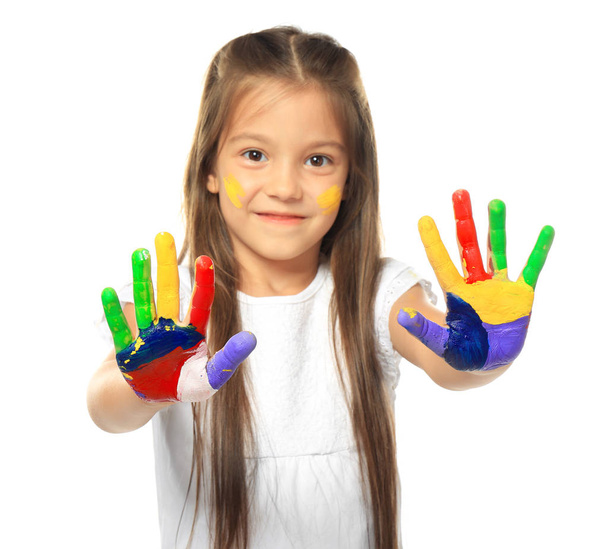 Little cute girl showing painted hands on white background - Foto, Imagen