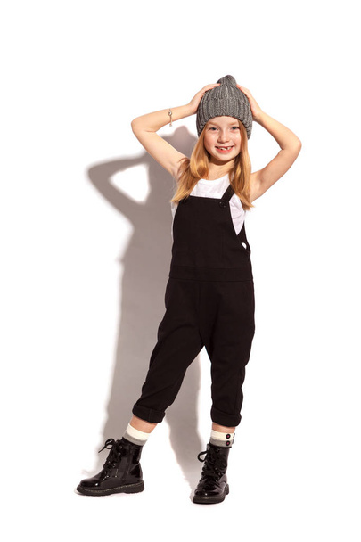 Blonde little girl wearing overalls - Photo, Image