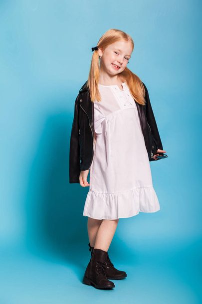 Blonde little girl wearing dress - Foto, imagen