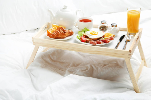 Tasty breakfast in bed  - Фото, изображение