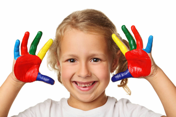 Beautiful little girl with colourful painted hands - Фото, изображение