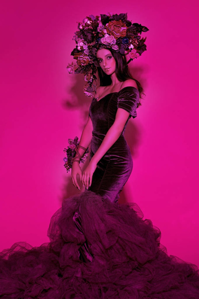 Portrait of a girl model in a beautiful image with a wreath of f - Zdjęcie, obraz