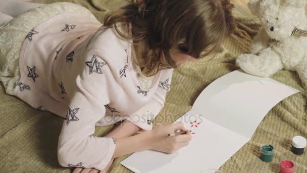 Talented girl neatly drawing with gouache beautiful flowers in her album, hobby - Filmagem, Vídeo
