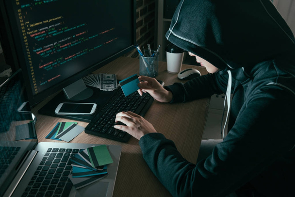 high angle view photo of hacker using computer  - Фото, изображение