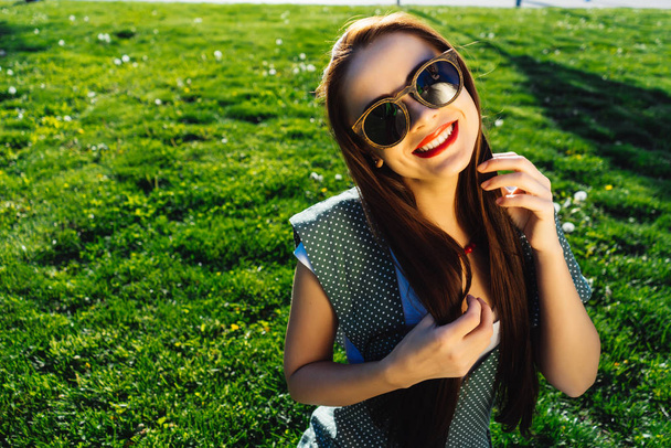 young smiling woman in sunglasses outdoor.girl in glasses - Photo, image