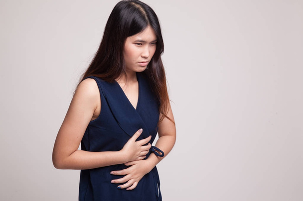 Young Asian woman got stomachache. - Photo, image