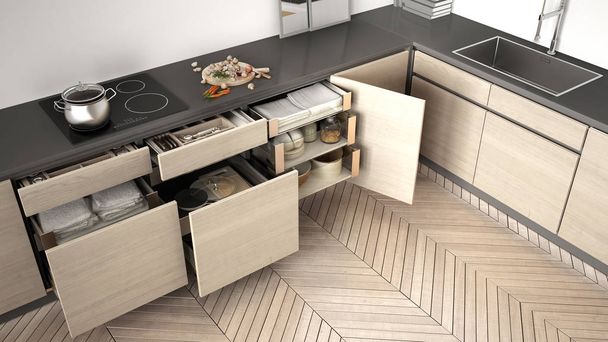 Widok z góry nowoczesną kuchnię, otwarte szuflad drewnianych z akcesoriami  - Zdjęcie, obraz