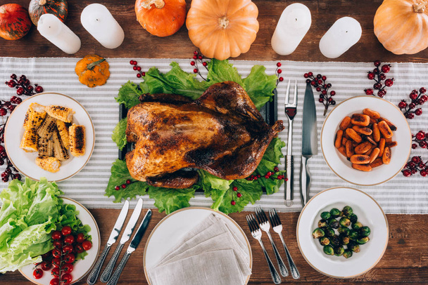 Baked turkey in middle of served table - Photo, Image