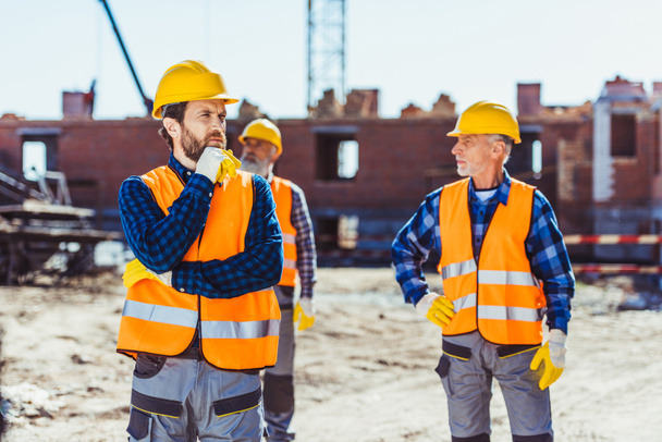 Construction workers at site - Zdjęcie, obraz