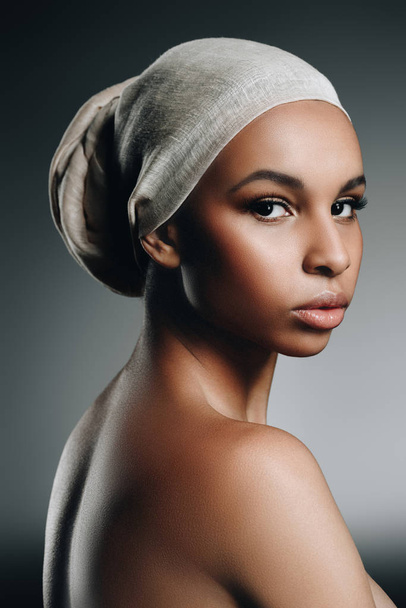 african american girl in white turban - 写真・画像