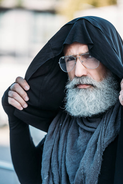 fashionable senior man on street - Фото, изображение