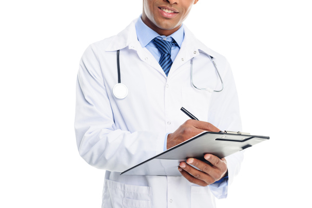 doctor writing diagnosis - Фото, изображение