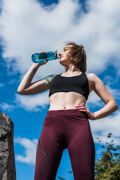 fit woman drinking water - Photo, Image