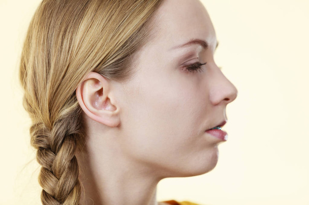 Half woman face with braid hair - Фото, изображение