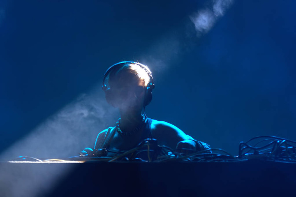 dj performing on a stage - Photo, Image