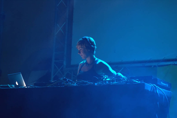 dj performing on a stage - Photo, Image