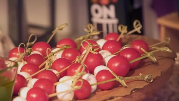 Canapes cherry tomato with cheese - Filmati, video