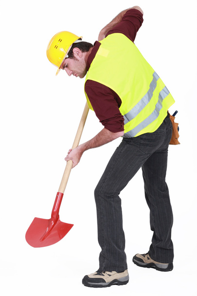 Worker digging with a shovel - Foto, Imagem