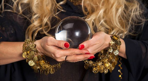 Crystal ball and fortune teller hands.  - Фото, зображення