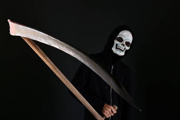 High contrast image of the grim reaper with a scythe - Photo, Image