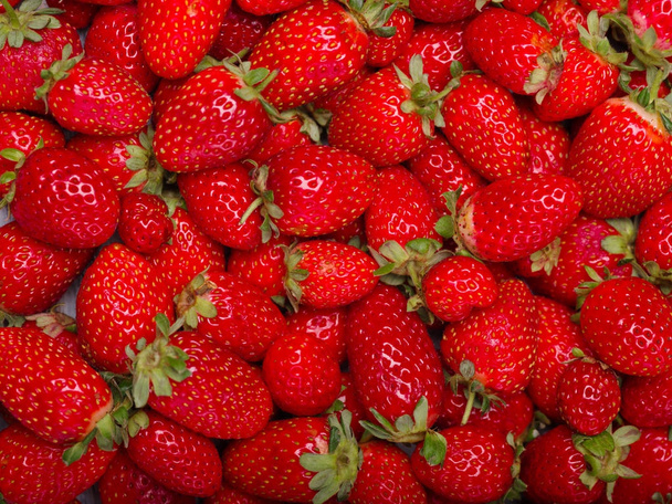 A top view on a fresh ripe strawberries. Food concept. - Valokuva, kuva