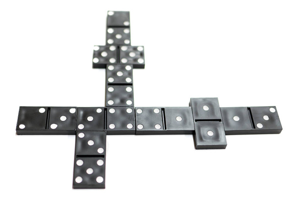 Game of dominoes is laid out on a white background - Foto, Imagem