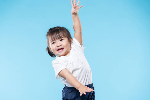 Baby girl raise hand up  - Foto, Imagem