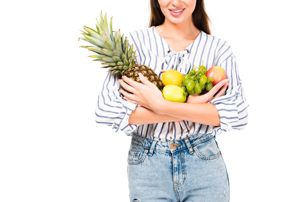 γυναίκα που κρατά διάφορα φρούτα - Φωτογραφία, εικόνα