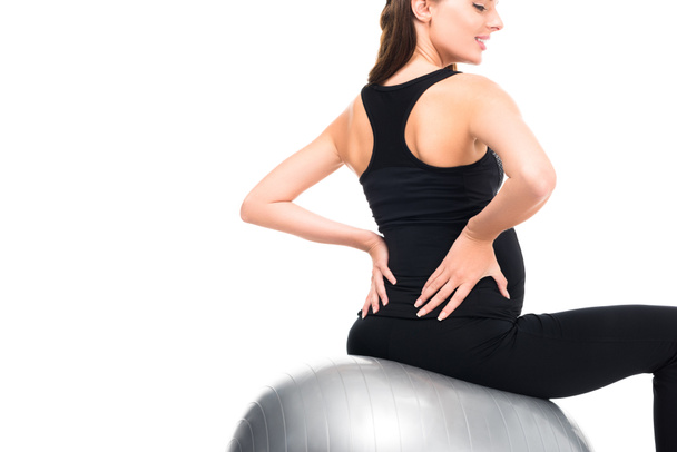 pregnant woman exercising on fitness ball - Photo, Image