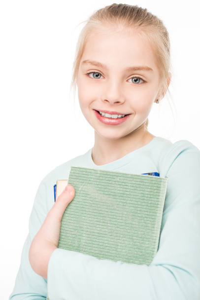 schoolgirl holding books - Φωτογραφία, εικόνα