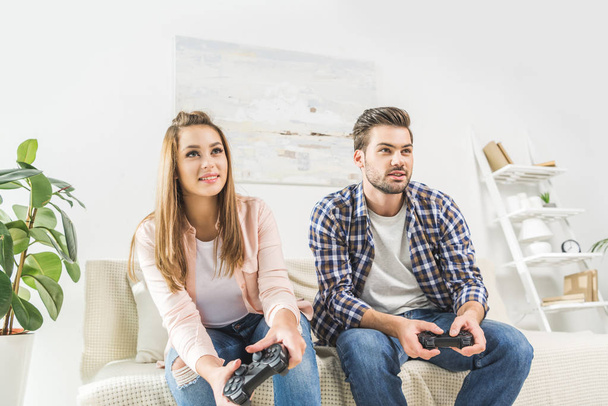 couple playing videogame - Photo, Image